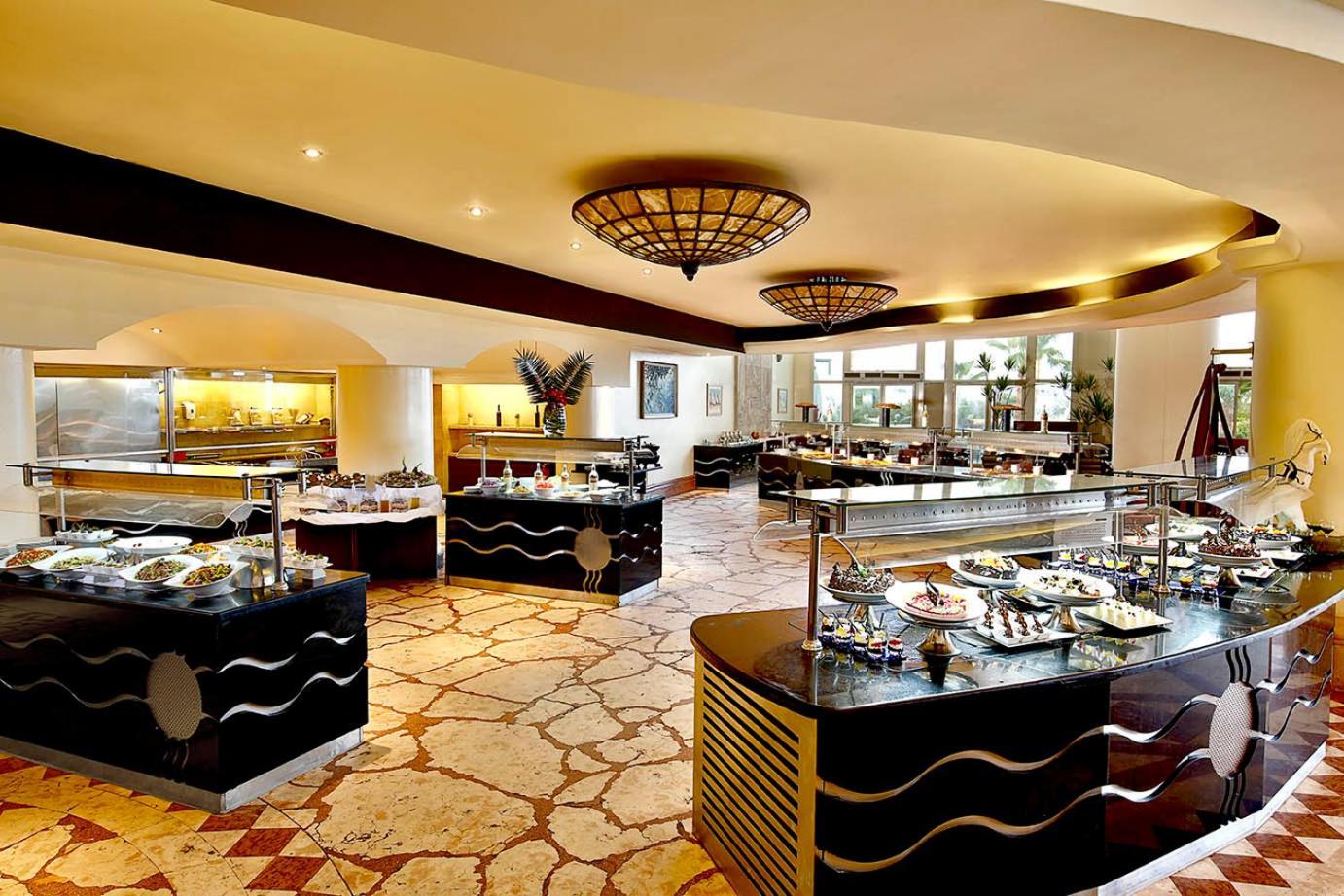 Safir Sharm Waterfalls Resort Exterior foto The buffet at the Grand Hyatt Hotel, Dubai